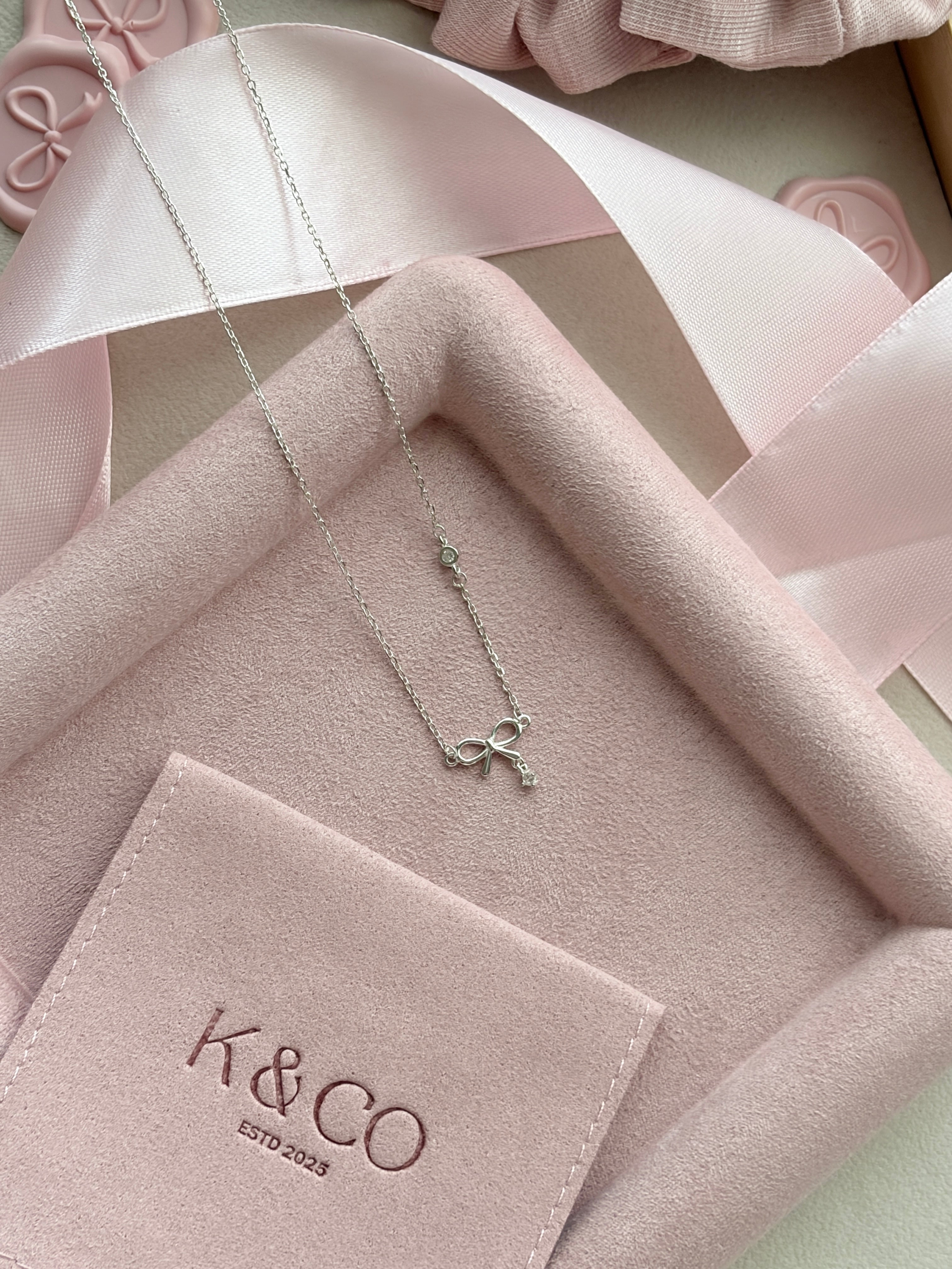 Lacey Bow Sterling Silver Necklace