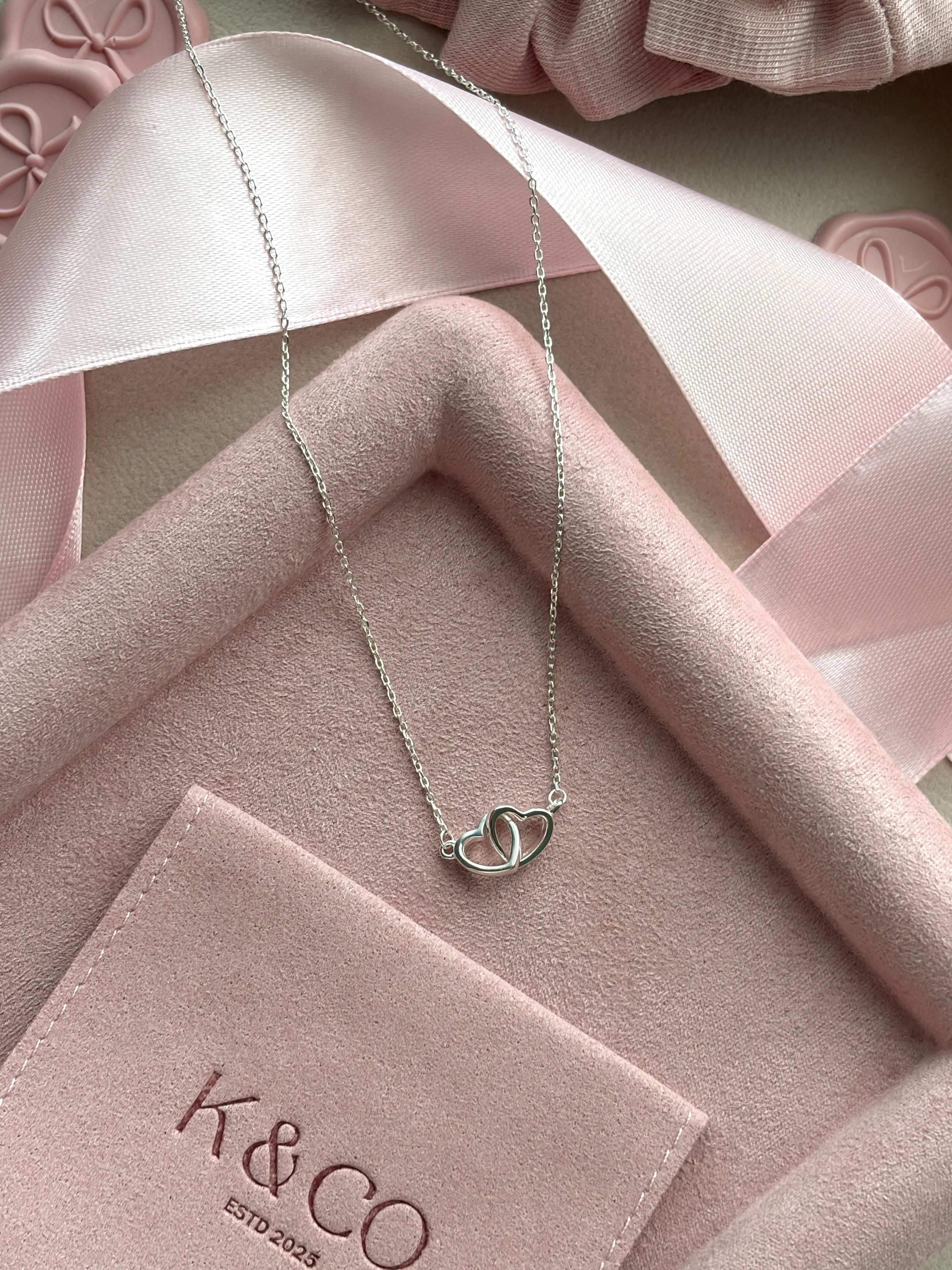 Intertwined Hearts silver necklace